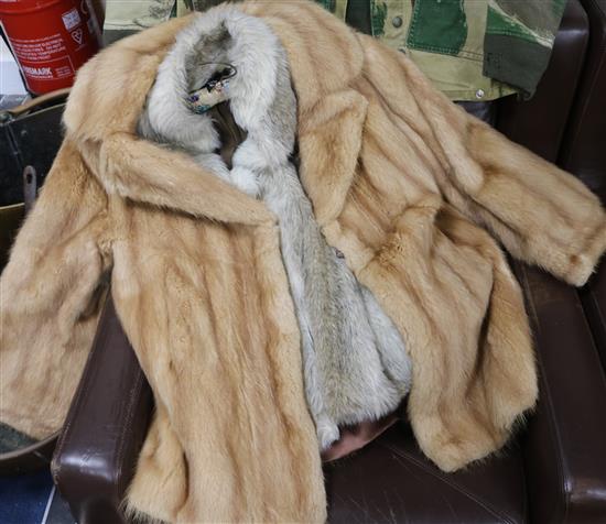 A blond mink three-quarter length fur jacket and a simulated fox fur jacket
